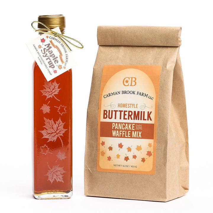 Autumn leaf bottle filled with amber rich taste maple syrup comes with buttermilk pancake and waffle mix.