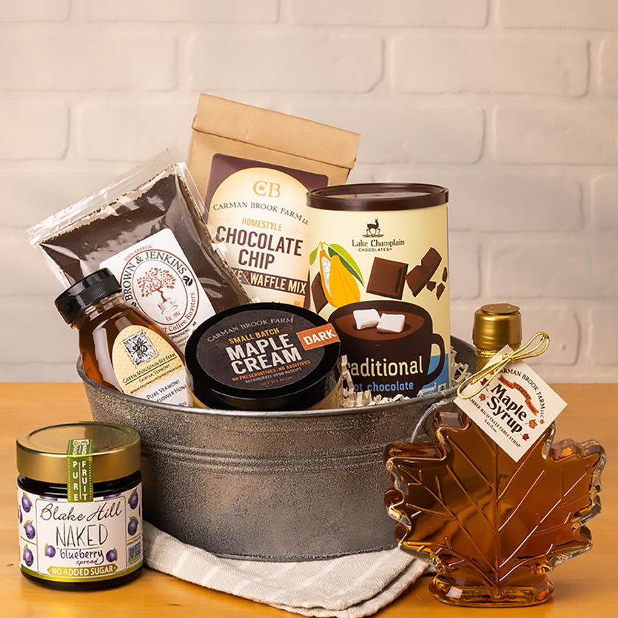 Hot chocolate and cocoa, pancake mix and syrup, preserves and maple spread round out this breakfast gift basket.