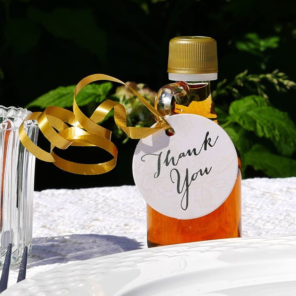 Adding a thank you hang tag to wedding gifts for guests sends the message of appreciation to your wedding guests.