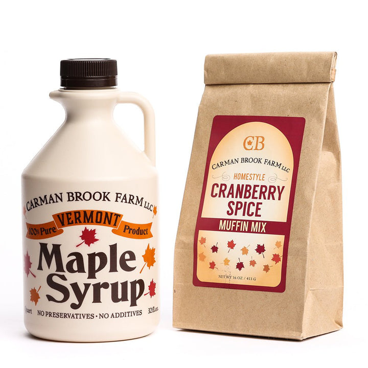 Quart of maple syrup and cranberry spice muffin mix.