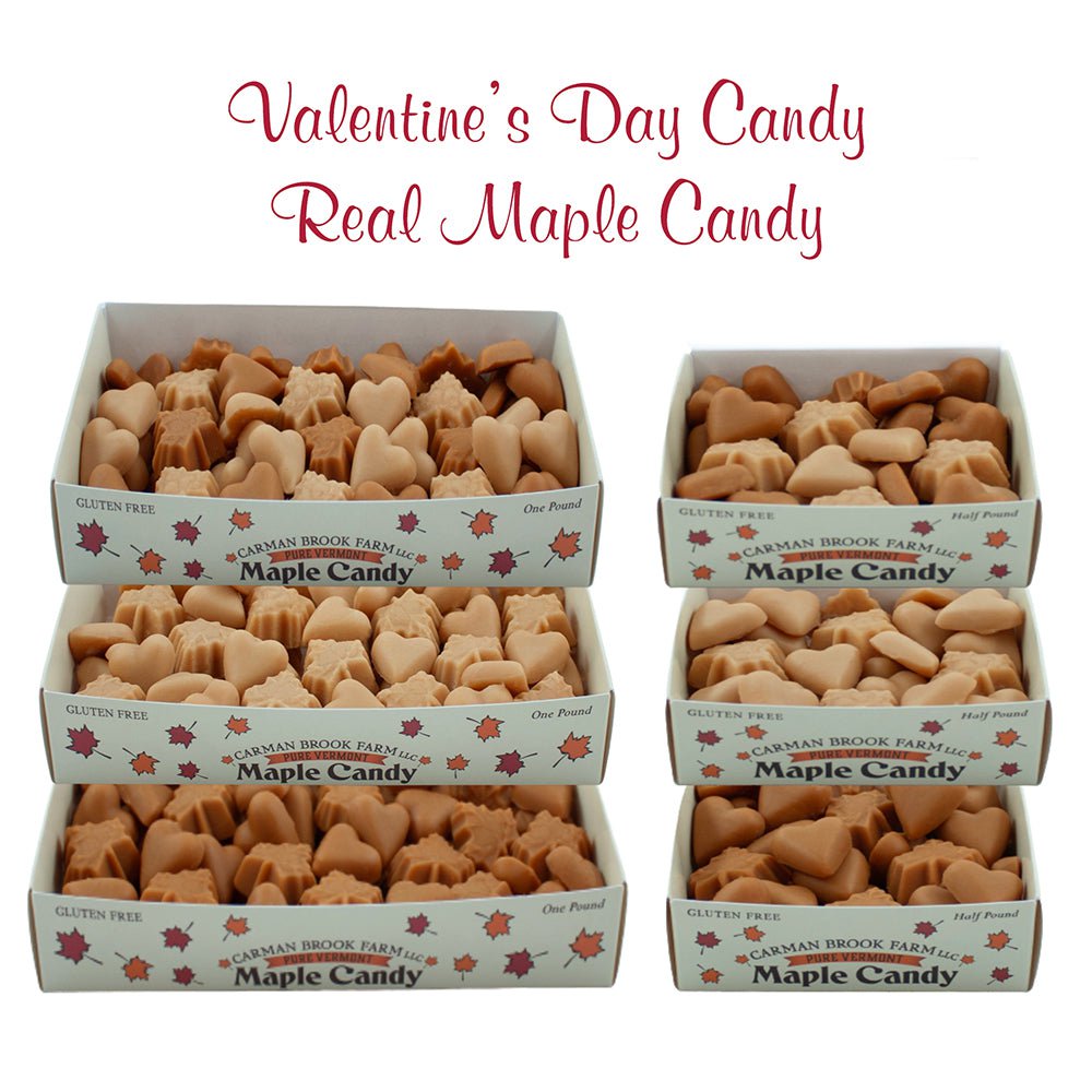 A selection of real Vermont maple  candy in heart shapes mixed with maple leaves.