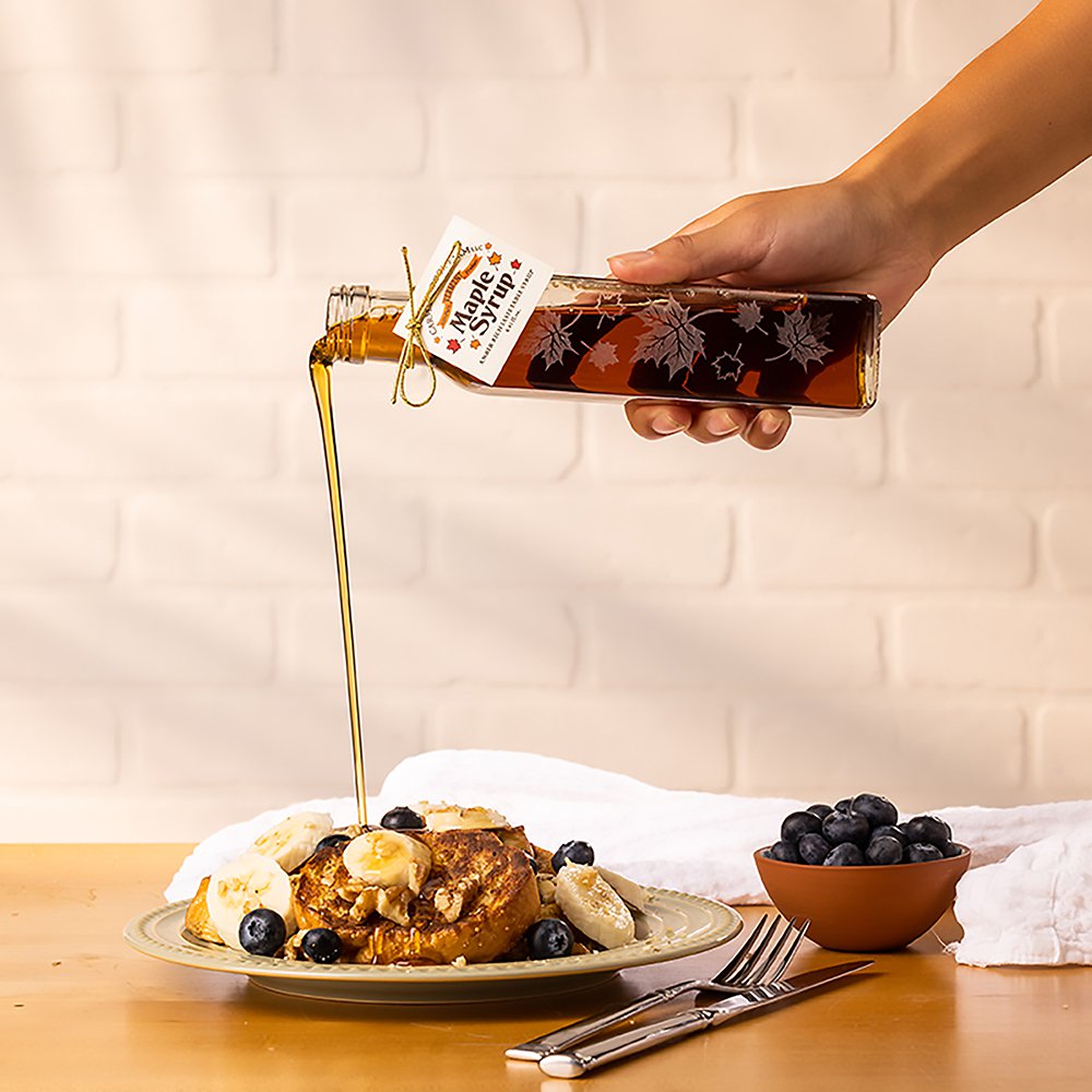 Maple syrup pouring over French toast asks the question, is maple syrup good for you?