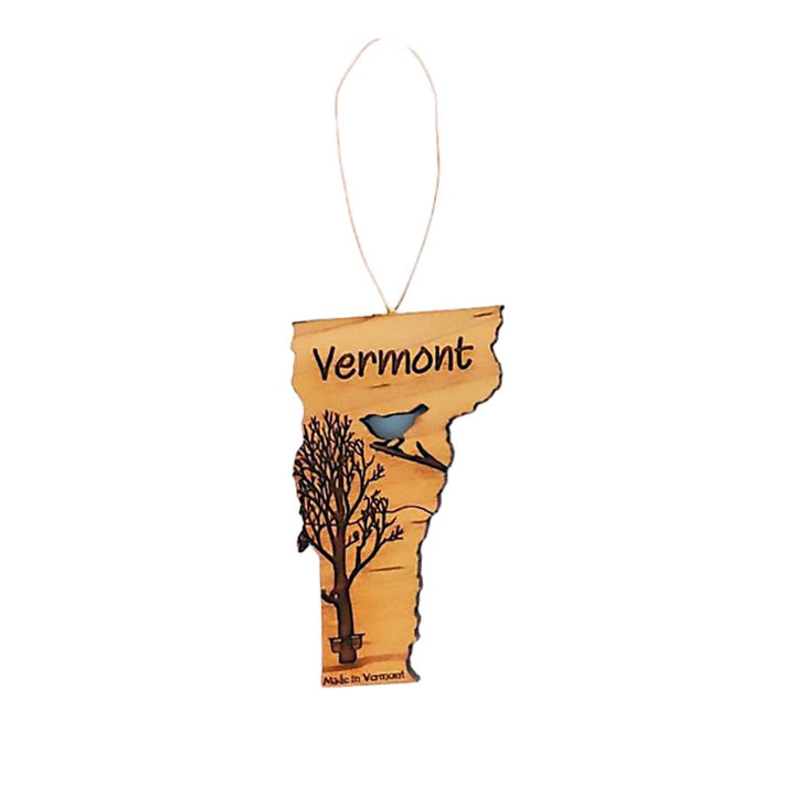 Spring ornament made of wood with a cutout of a bird in the state of Vermont.